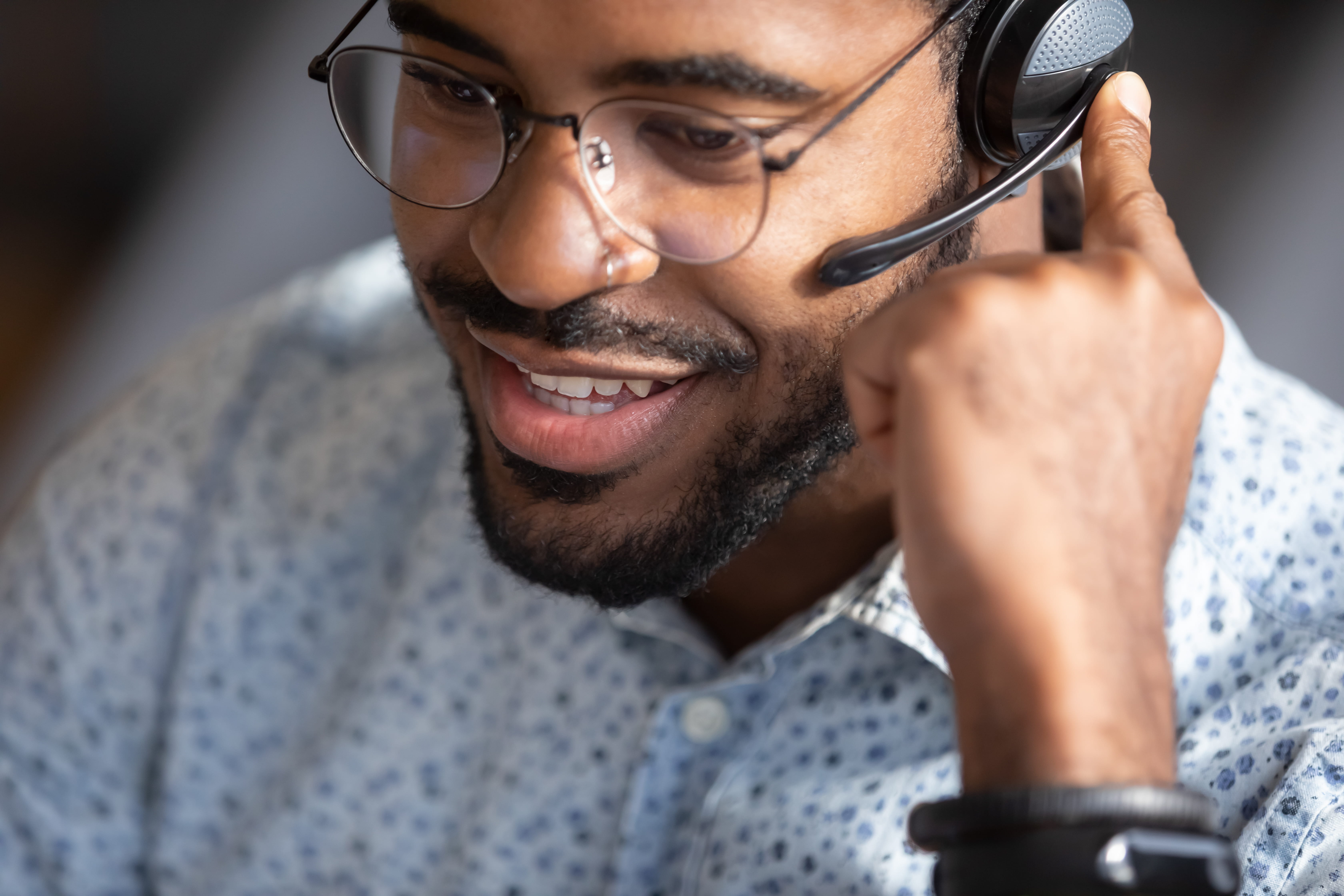 Government agent providing customer service over the phone while administering the client's file.