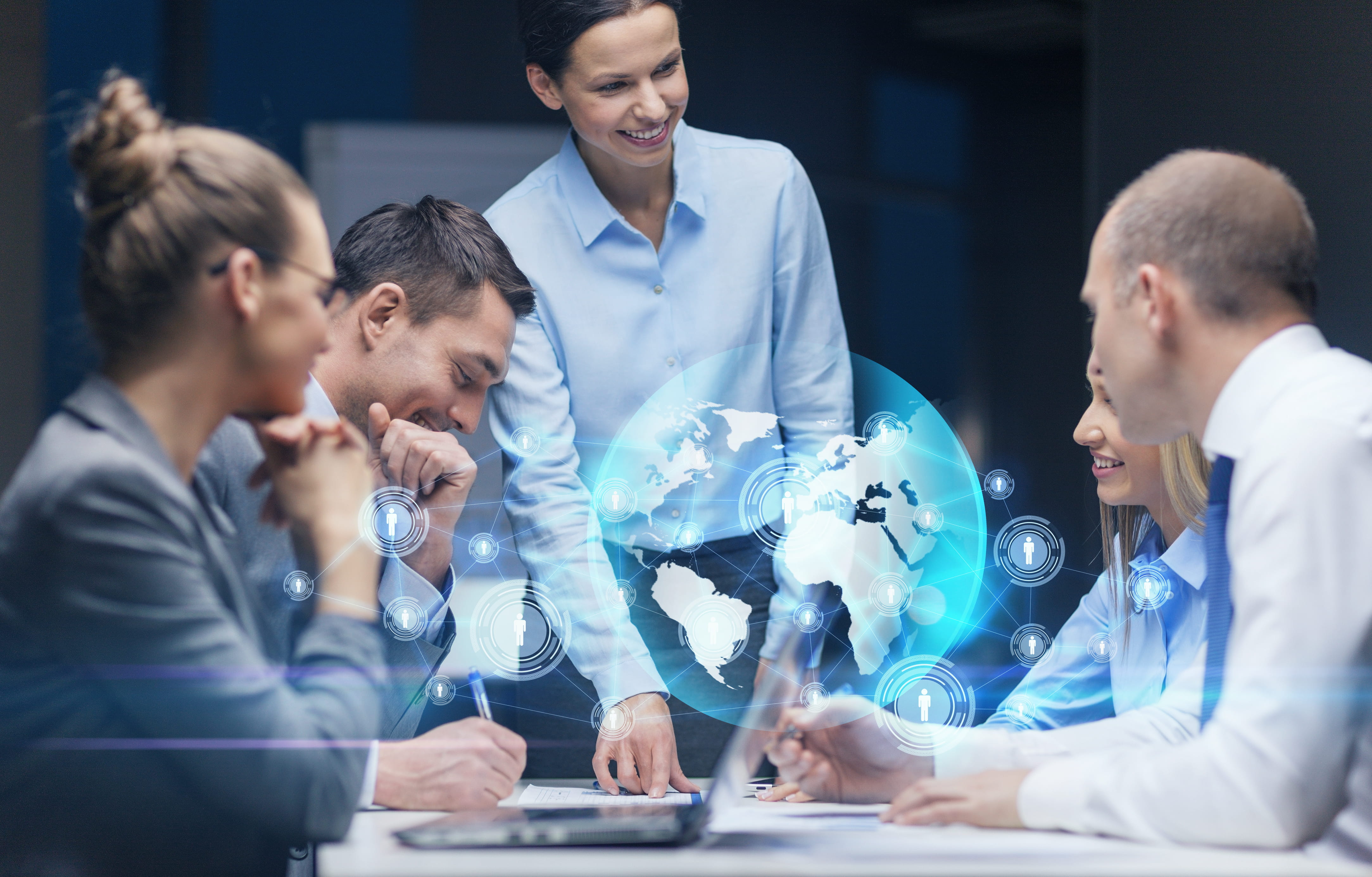 group of professionals with global graphic overlay