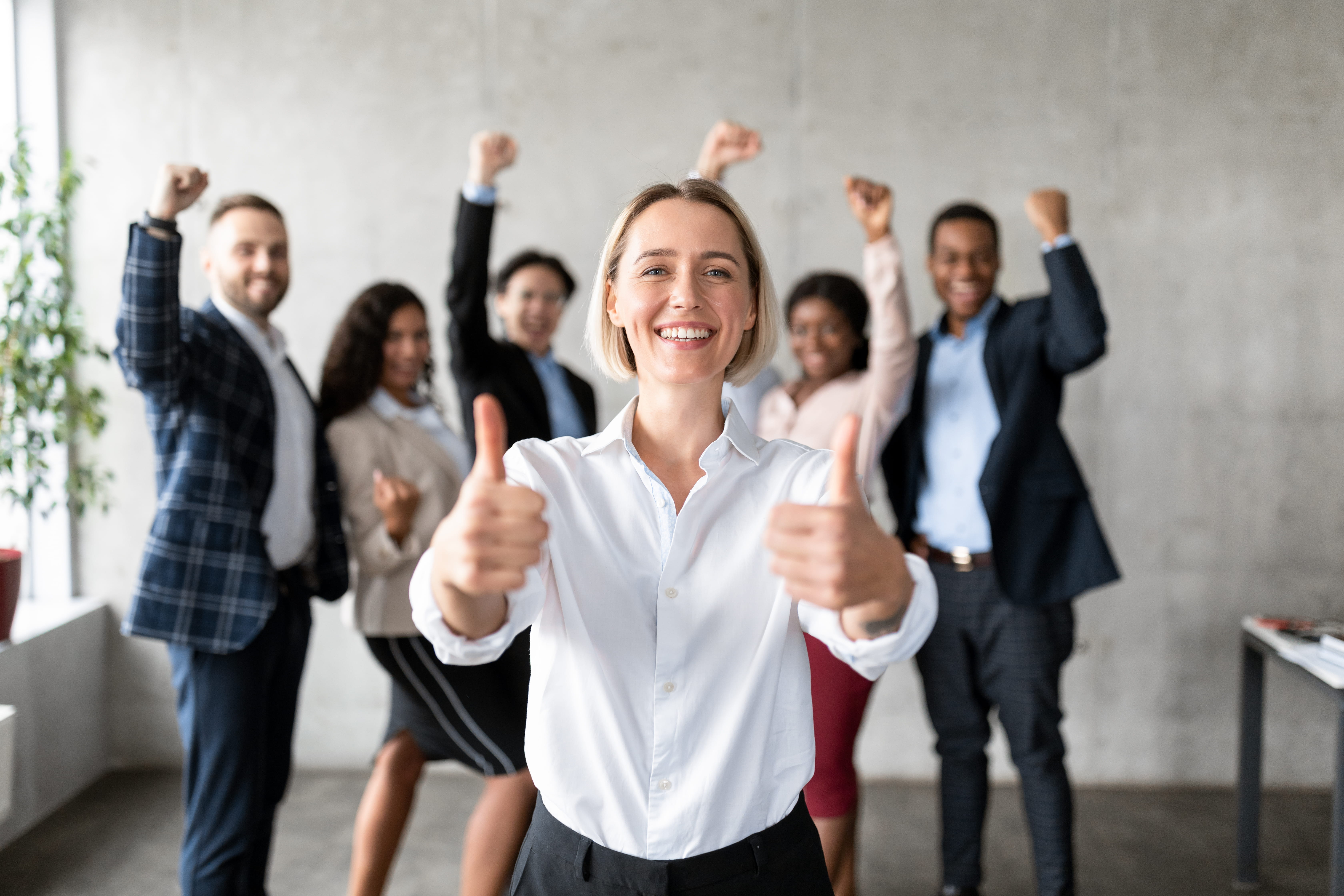 woman giving thumbs up